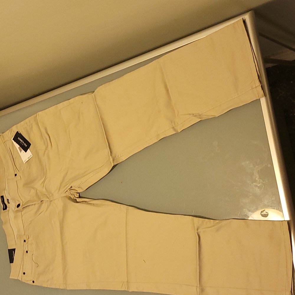 Tan pair of Kenneth Cole 5-pocket pants